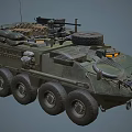 Military Wheeled Tank With Top Mounted Weaponry And Olive Green Exterior