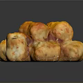 Golden Fried Pastries Stacked With Crispy Texture And Sugar Glaze