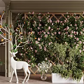 Blooming Climbing Roses and Green Plants on Trellis with White Deer Statue in Indoor Garden