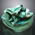 Pile Of Crumpled Green Woven Sacks With Textured Fabric And Used Appearance
