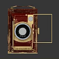 Vintage Red Foldable Camera With Golden Lens And Leather Body Design