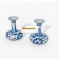 Pair of Blue and White Ceramic Candle Holders with Floral Vine Patterns