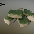 Green Moss Covered Stone Blocks Scattered in Natural Arrangement with Shadow Effects