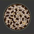 Delicious Chocolate Dessert Pizza Topped With Chunks Yellow Crumbles And White Powder On Blue Plate
