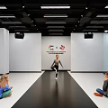 Indoor Fitness Activity Featuring Female Trainer With Children Adults Watching And Background Logo