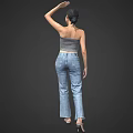 A Woman Wearing Striped Tube Top And Jeans Raising One Arm Against Gray Background