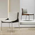 Modern Dining Chairs Featuring Grey Fabric Seats Wooden Backrests Black Frames And Metal Legs