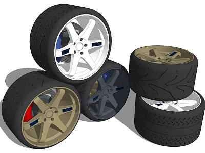 High Quality Tires With Silver Gold Black Alloy Rims Stacked And Displayed 3d model