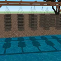 Aquatic Animals In Hanging Black Cages Under Wooden Frame Over Water With Sandy Ground