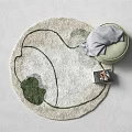 Round Rug With Green Patterns Soft Texture Gray Cushion And Book For Modern Home Decor