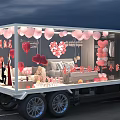 Romantic Truck Interior With Pink Balloons Heart Decorations And Sofa Setup