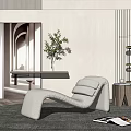 Modern Curved Lounge Chair in Cozy Indoor Setting with Wooden Side Table and Green Plant