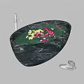 Black Marble Oval Bathtub With Yellow Pink Flower Petals Silver Faucet And Slippers