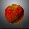 Fresh Vibrant Red Apple With Yellow Speckles On Dark Background