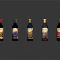Colorful Wine Bottles With Various Label Designs Arranged On Dark Reflective Background