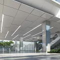 Modern Building Entrance Lobby With Metal Ceiling Lighting Glass Walls And Staircase Greenery