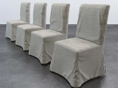 Four Stylish Light Gray Dining Chairs with Slipcovers on Gray Floor 3d model