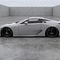 Stunning White Sports Car With Aerodynamic Body And Large Black Alloy Wheels