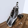 Golf Sports Equipment With Golf Bag Clubs Balls And Black Storage Case On Wooden Floor