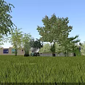 Tranquil Rural Landscape With Lush Green Grass Tall Trees And Light Building With Blue Windows