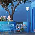 Top Outdoor Photo Check In Spot With Blue Circular Bar Decorative Tree Balloons And Desserts