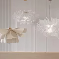 Modern White Flower Shaped Chandeliers Hanging In Elegant Vertical Striped Interior