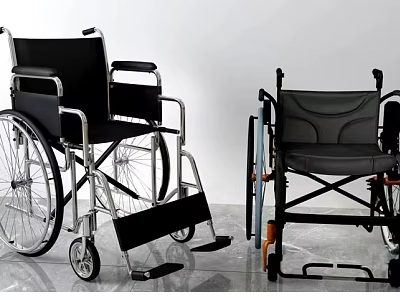Comfortable Medical Equipment Wheelchair With Black Seating And Foldable Metal Frame 3d model