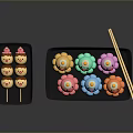 Colorful Animal Shaped Snacks Including Chicken and Octopus on Black Trays with Chopsticks
