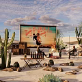 Desert Camping Site With Outdoor Movie Screen Cacti And Seating Area