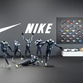 Nike Models In Dynamic Poses Wearing Sportswear With Shoe Display Wall In Store