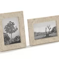 Two Beige Photo Frames with Marble Texture Displaying Tree and Mountain Landscape Prints
