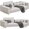 Light Beige Sectional Sofa With Gray Cushions And Striped Throw Blanket 3d model