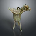 Antique Bronze Wine Cup With Ox Head Decoration And Three Legs Design