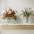 Colorful And White Flowers Arranged In Glass Vases On Marble Top Wooden Cabinet
