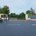 Automatic Entrance Gate With Security Booth And Green Trees Along Driveway 3d model