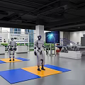 Modern Corporate Exhibition Hall Interior With Digital Screens And Robot