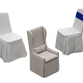 Elegant Event Chairs Including White Skirted Seats And Gray Armchair With Blue Sash
