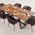 Six Rattan Chairs And Wooden Dining Table Set With Plates And Cups