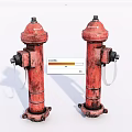 Two Red Fire Hydrants As Fire Safety Equipment With Rusty Details And Valve Connections