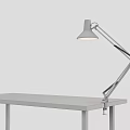 Modern Black Adjustable Arm Desk Lamp On Wooden Desk With Gray Background