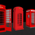 Three Iconic Red Telephone Booths Classic Public Facility with Glass Panels