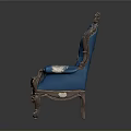 Ornate Blue Chair With Golden Carvings And Floral Upholstery Classic Design For Elegant Interiors