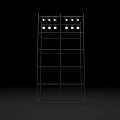 Multi tiered Metal Shelving Unit Featuring Round Objects On Top
