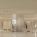 Korean Women's Clothing Store with Fashionable Dresses on Mannequins Modern Interior and Elegant