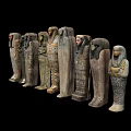 Ancient Egyptian Sarcophagi Collection With Intricate Carvings And Ornate Designs