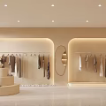 Modern Clothing Store Interior With Circular Decor Staircase Platforms And Hanging Garments