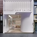Modern Withmf Hair Salon Storefront Featuring White Exterior Curved Design And Glass Door