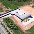 Aerial View Of Construction Site With Building Structure Construction Equipment Road And Green Trees