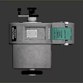 Industrial Silver Metallic Mechanical Device With Green Label Knob And Ports