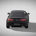 Sleek Black Mercedes Coupe Featuring Modern Design And UK License Plate